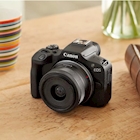 Immagine di Fotocamera digitale mirrorless CANON EOS R100 + RF-S 18 45MM IS STM 6052C013